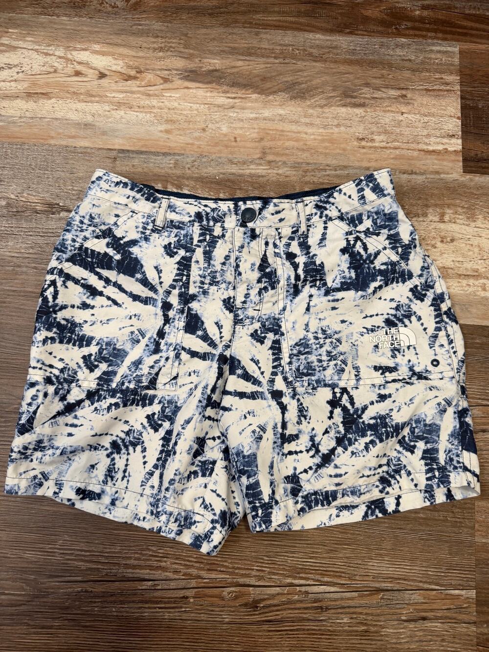 The North Face girls' shorts featuring a blue white tie-dye print sz L 12-14 EUC